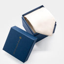 【ネクタイ】祝福の白練色 オリジナルロゴ | 国産シルク | SHAKUNONE (贈答用の紙袋付き)