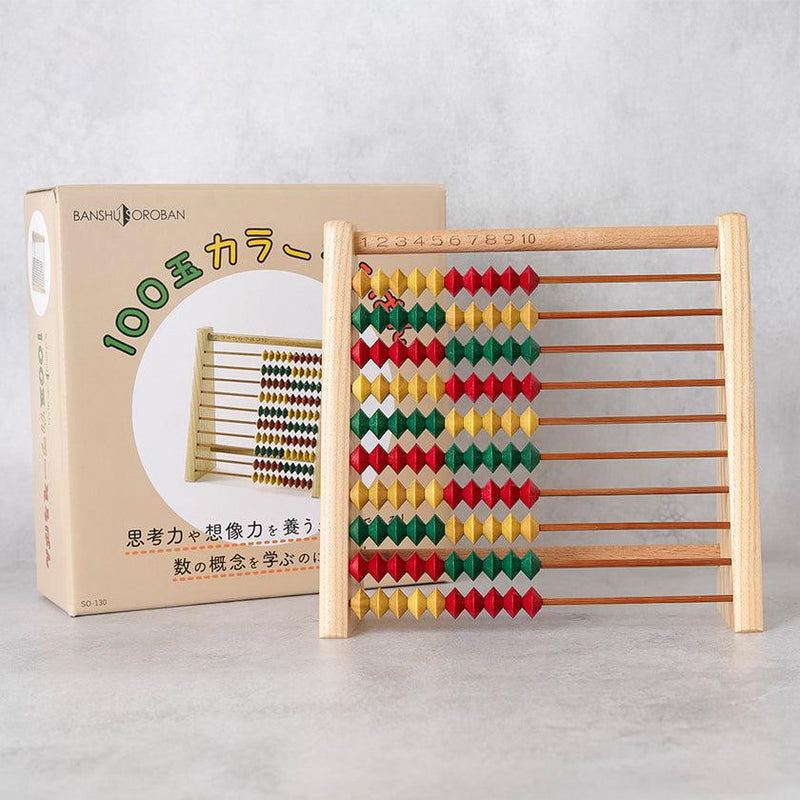 100玉カラーそろばん（播州そろばん）の本体と化粧箱を並べた物撮り｜播州算盤工芸品協同組合